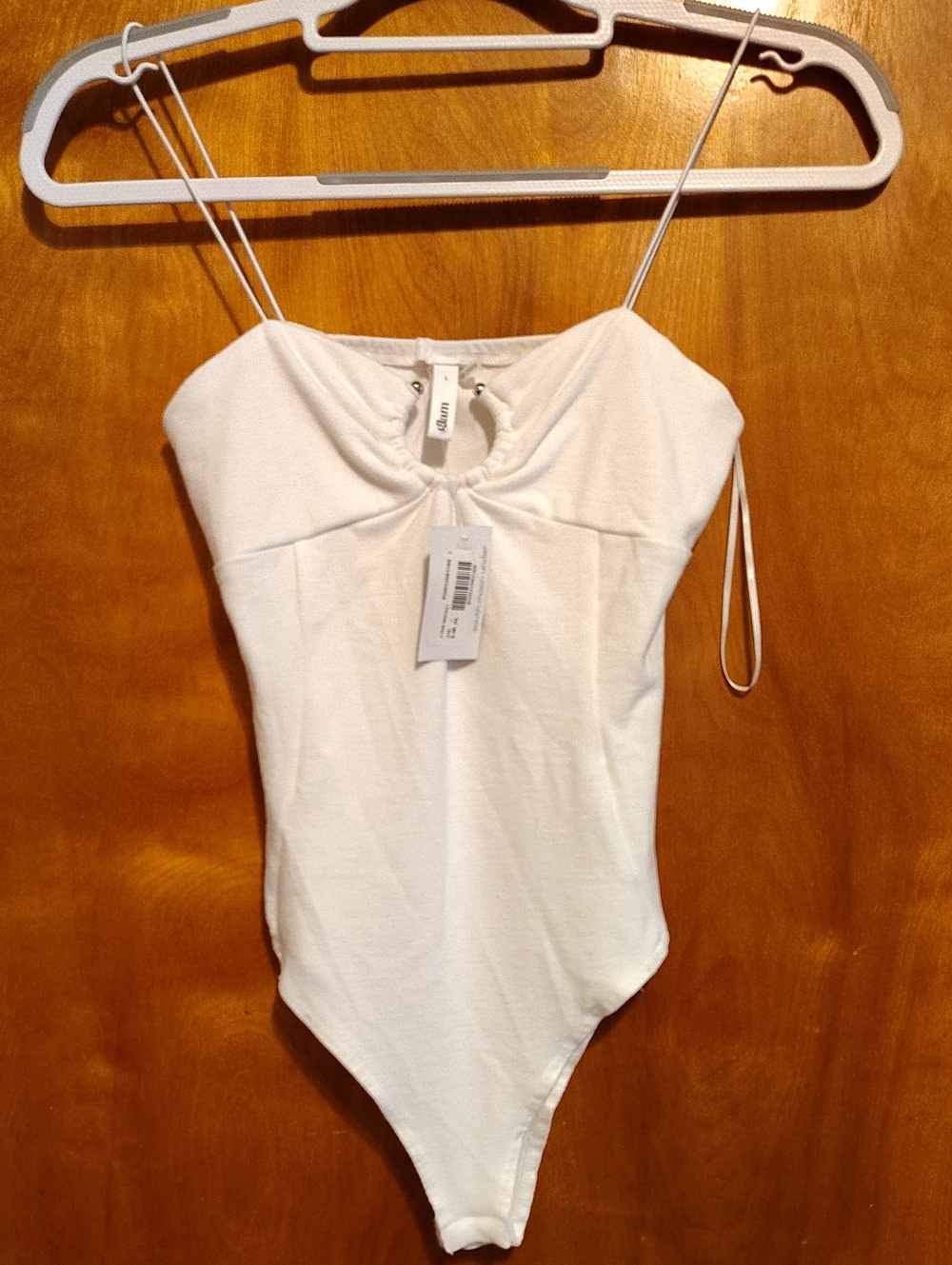 glam White Spaghetti-Strap One-Piece Bodysuit